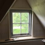 Interieur - Het aftimmeren van een dakkapel in een slaapkamer